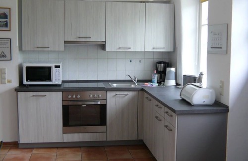 Muritz Casa | 2 apartamentos en la casa incl. Chimenea y sauna en las superficies lago, Klocksin