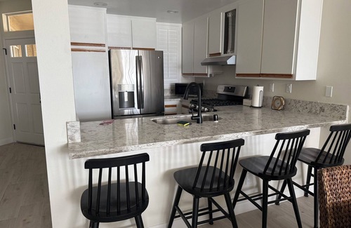 Corona Condominio | 2-bedroom condo in the Sierra Del Oro neighborhood in Corona, CA with AC, WiFi.