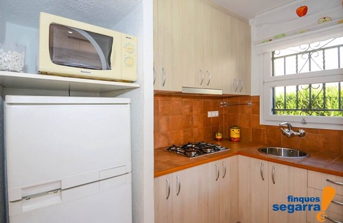 El Roc de Sant Gaieta Apartamento | Casa 2 dormitorios con piscina privada, barbacoa y AA/CC