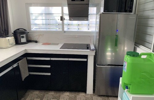 Antipolo Condominio | 2 BR condo w/ BREAKFAST PARKING NETFLIX DISNEY+ WIFI AND TOILETRIES