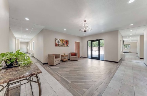 Eastside Promise Neighborhood Hotel | 2 Family-Friendly Rooms Near DT Entertainment Venues w/ Free Breakfast