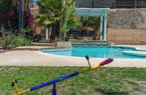 Estates at Canyon Crest Casa | 2 king beds, near UCR, pool & arcade.
