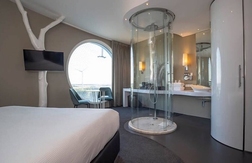 Zuidoost Hotel | 2 Modern Haven, Steps from City Center, Shops | Scenic Nature Trails Nearby