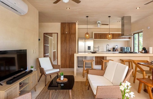 Costa Condominio | 2 Private Outdoor Lounge Patios | 2 Cenotes Onsite