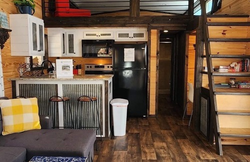 Mill Spring Casa | 2-story tiny home nestled on the creek, quick walk to pool and playground, private firepit, sleeps 7.