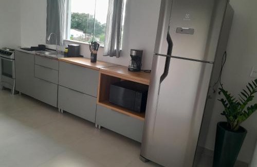 Jardim Iate Clube Apartamento | 2 vagas de estacionamento, a 7 min da praia