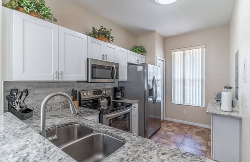 Wellington Casa | Family-Friendly 4BR Corner Townhome | Regal Palms Resort Pool & Clubhouse | Near Orlando Parks