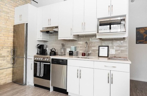 Exchange District Condominio | Loft de 2 dormitorios de carácter en el corazón de Winnipeg