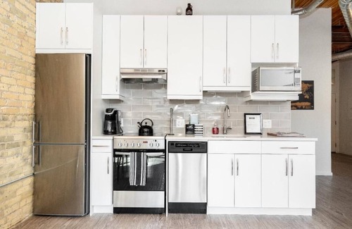 Exchange District Condominio | Loft de 2 dormitorios de carácter en el corazón de Winnipeg