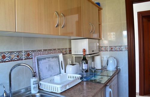 Torrox Costa Apartamento | Primera línea, con maravillosas vistas al mar y a la montaña, con vistas a hermosos jardines
