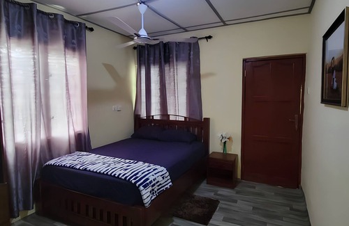 Winneba Casa | 25 minutes to Winneba Beach!! A quiet family suite with dining and living area.