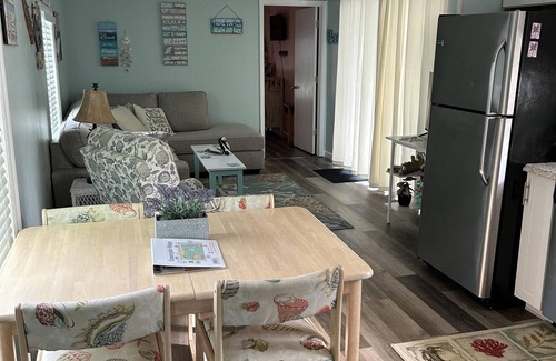 Garden City Cabaña | Flamingo Beach Cottage Oceanside Village Waterfront