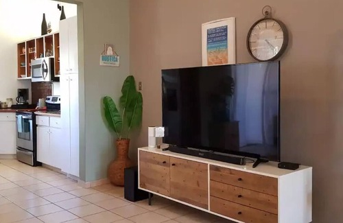 Candelero Abajo Villa | 2BR / 2BA Villa cerca de la playa, golf w / WiFi, amplio balcón, vistas a la piscina / jardín