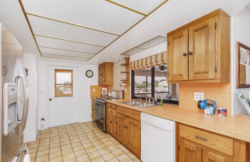 Bokeelia Casa | 3/2 in Bokeelia with INCREDIBLE GULF ACCESS, BOAT SLIP INCLUDED! ​​​​​​​Spacious upstairs unit with amazing porch overlooking canal!