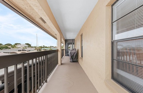 Bokeelia Casa | 3/2 in Bokeelia with INCREDIBLE GULF ACCESS, BOAT SLIP INCLUDED! ​​​​​​​Spacious upstairs unit with amazing porch overlooking canal!