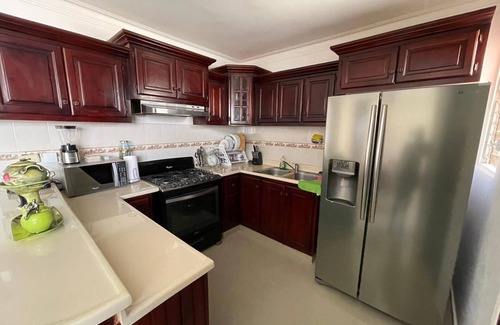 Gregorio Luperon Casa | 3 bedroom furnished apartment with pool gym parking 24 hours security