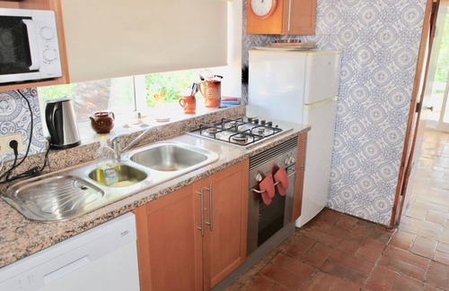 Olhao Casa | 3 cabañas rústicas restauradas con cariño en hermosos jardines con impresionantes vistas al mar