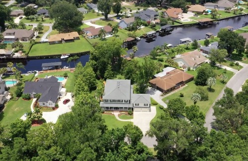 Doctors Inlet Casa | 30 People Comfortably Gorgeous Home on Canal Boat Kayak access Two 85" & 75” TVs