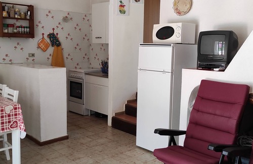 Villaggio Mandorli Casa | 350 mt from Campus, small bungalow with outdoor space surrounded by greenery.