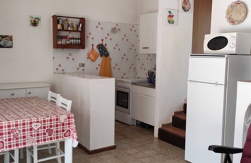 Villaggio Mandorli Casa | 350 mt from Campus, small bungalow with outdoor space surrounded by greenery.