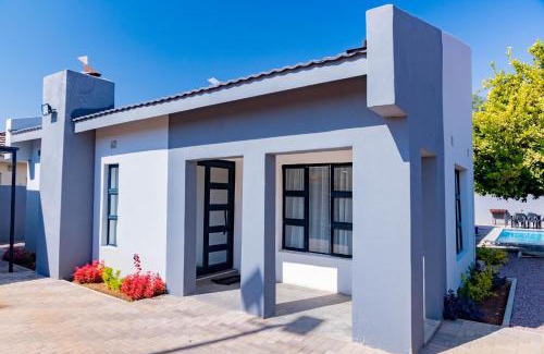 North-West District Apartamento | 3bd home with Starlink WiFi , pool, near CBD & Airport