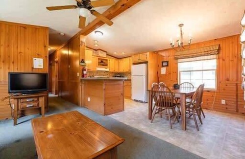 Neillsville Cabina | A short walk outside your cabin you can enjoy a great meal and at the Riviera Pub and Grill
