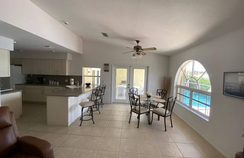 South Gulf Cove Villa | 4 BDRM 2.5 BATH Villa W/ SPECTACULAR Views of LARGE Waterway Heated Pool -Dock