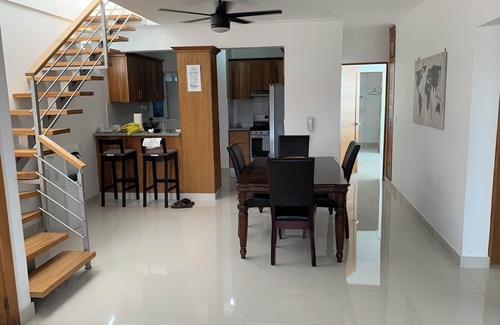 Santo Domingo Condominio | 4-bedroom condo Steps from Ocean w/Pier, parking, WiFi, AC, parks & shopping.