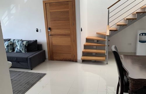 Santo Domingo Condominio | 4-bedroom condo Steps from Ocean w/Pier, parking, WiFi, AC, parks & shopping.