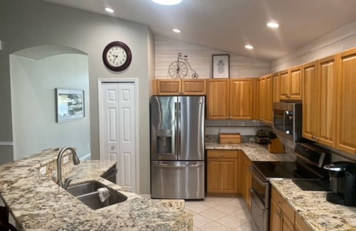 Imperial Lakewood's Casa | 4 Bedroom house with a heated pool on a public golf course