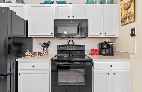 Kissimmee Casa | 4-bedroom townhome in welcoming Kissimmee pool home, 25 minutes from Disney!