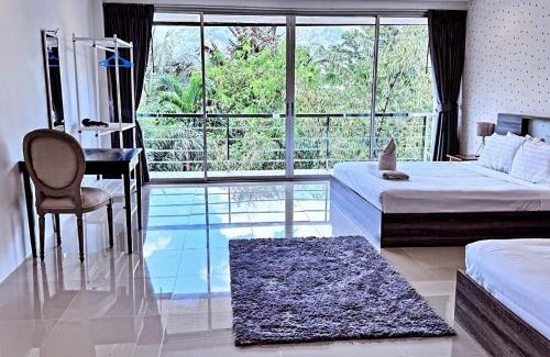 Kathu Casa | 4 bedrooms & bathroom for up to 12 guests 7kms to Patong beach at The Fairways golf villas