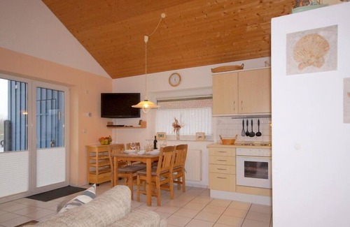 Norderteil Casa | 4-person vacation home with canoe, wood-burning stove and wonderful lake view in Otterndorf