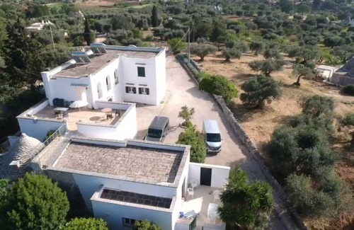 Cisternino Apartamento | 15% de descuento! 4 personas, espacioso apartamento en planta baja, piscina compartida y pista de tenis.
