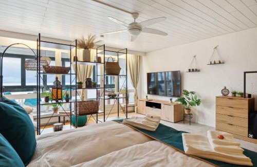 Ingenbohl Apartamento | 4 Seasons Apartment I 1-4 Personen I See, Bergsicht I 65' Smart TV, Tischkicker und Badewanne I Parkplatz