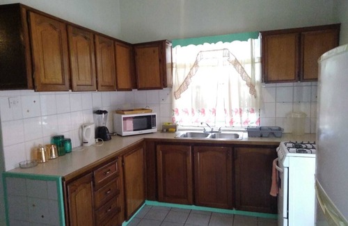 Bois d'Orange Condominio | 4 separate single bedrooms,bathrooms,living and kitchen.beach access