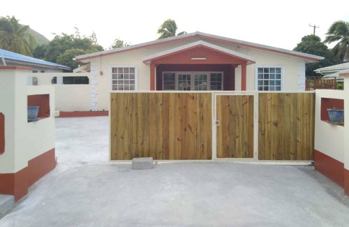 Bois d'Orange Condominio | 4 separate single bedrooms,bathrooms,living and kitchen.beach access