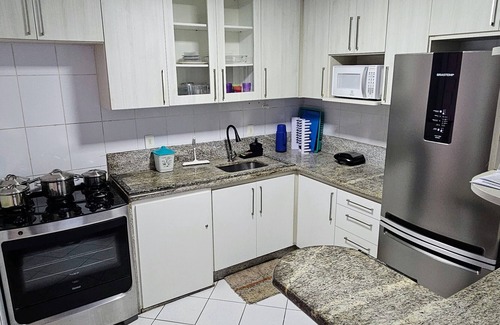 Praia do Morro Apartamento | 4 suites facing the sea with barbecue, 2 parking spaces, Wi-Fi