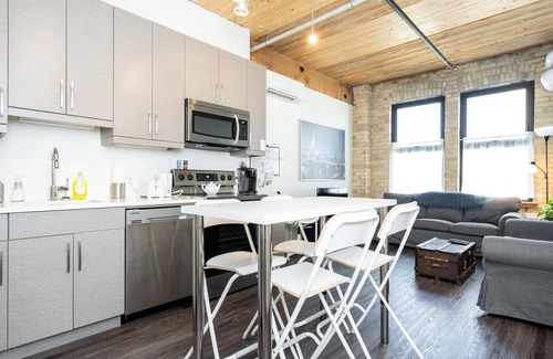 Exchange District Condominio | Condominio completamente amueblado con el encanto del viejo mundo y rodeado de comodidades modernas