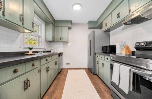 Charlotte Casa | 4223 Acorn · Bungalow w/ hand selected designer finishes