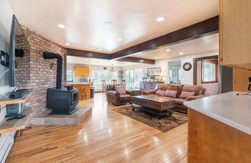 Colorado Springs Casa | 4BR 4BA multi-family with multiple outdoor & indoor living spaces, hot tub, BBQ.