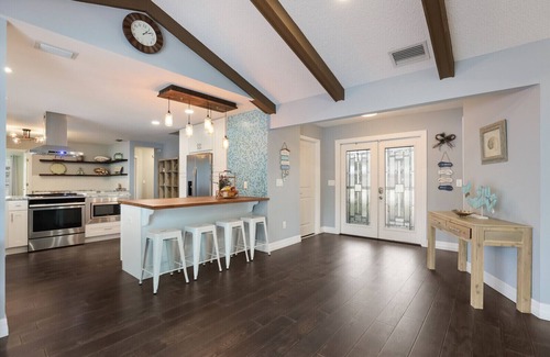 West Bradenton Casa | 4BR Saltwater Pool Oasis, Game Room, Outdoor Spa, & Tropical Garden Retreat