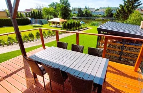 Ilawa Apartamento | 4jeziora - prywatny dostęp do rzeki, pomost, ogrodem, wiata grillowa, rowerek wodny, kajaki w cenie, parking, psiaki dozwolone