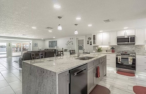 Port Richey Casa | 5-Bedroom Water Front Vacation Home - Tropical Paradise with Breathtaking Views!