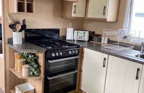 Cresswell Otro | 5 Birth Static Caravan Partially Adapted, Walk in Shower/Shower Chair