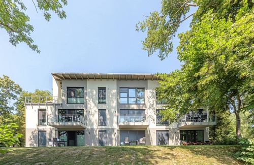 Krakow am See Apartamento | 5-star vacation apartment Sonnengruß with a side view of Lake Krakow