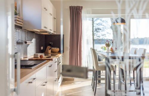 Krakow am See Casa | 5 Sterne Ferienhaus direkt am See mit Sauna-Kamin-Garten