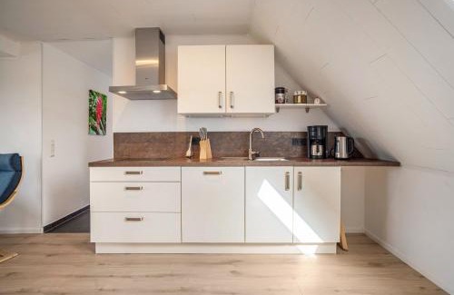 Glowe Apartamento | 5 Sterne Ferienwohnung Boddenblick