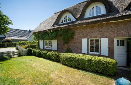 Pantow Casa | 5 Sterne Reetdachhaus Wildröschen