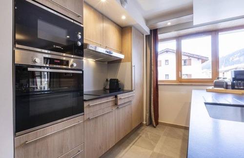 Lanslevillard Apartamento | 150m del centro estación, fitness, piscina, sauna, hammam, balcón, chimenea o estufa a leña, tv